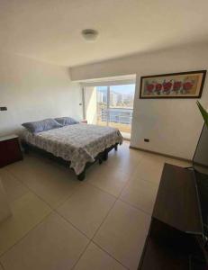 Postel nebo postele na pokoji v ubytování Cómo Nuevo Depto, Mejor Ubicación Ñuñoa!!