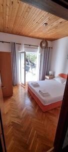 Postel nebo postele na pokoji v ubytování Apartment Bilan