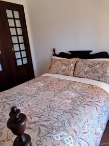 A bed or beds in a room at Casa rural Villa Manuela
