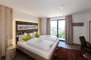 Katil atau katil-katil dalam bilik di Aparthotel Bacher +138 gambar