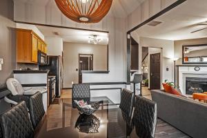 a kitchen and living room with a table and chairs at Suburban Family Retreat - Outdoor Garden -sleep 10 in Duluth