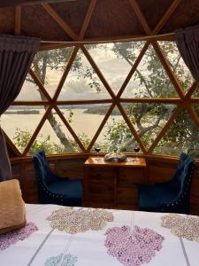 Glamping Domos del Lago客房内的一张或多张床位
