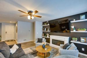 A seating area at Wellston Home with Private Hot Tub and Fire Pit!