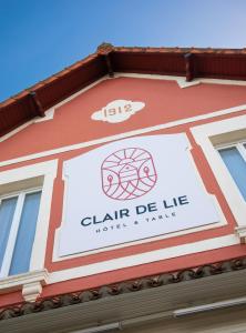 a sign on the side of a building at Clair de Lie in Vallet
