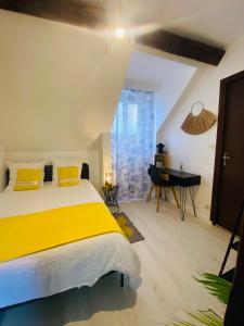 Postel nebo postele na pokoji v ubytování Maison Le V - Proche Disney