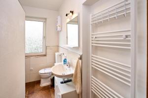 Koupelna v ubytování Ferienwohnung Haus Waldblick + 26 fotografií