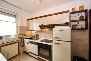 Kuchyň nebo kuchyňský kout v ubytování Ferienwohnung Haus Waldblick
