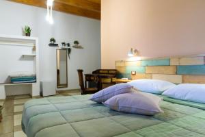 Ένα ή περισσότερα κρεβάτια σε δωμάτιο στο Agriturismo La Ferrovia