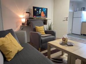 TV o dispositivi per l'intrattenimento presso Apartman Una