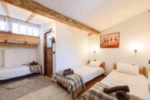 Postel nebo postele na pokoji v ubytování Chalet Garibaldi - Total Chalets