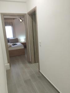 Postel nebo postele na pokoji v ubytování GRAMMENOS HOUSE
