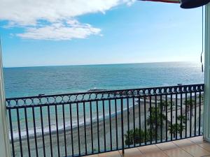 a view of the ocean from a balcony at BALCON PLAYA Y PISCINA Velimar PONDOS in Almuñécar