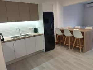 Kuchyň nebo kuchyňský kout v ubytování GRAMMENOS HOUSE