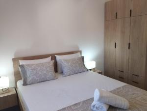 Postel nebo postele na pokoji v ubytování GRAMMENOS HOUSE