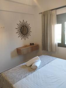 Postel nebo postele na pokoji v ubytování GRAMMENOS HOUSE