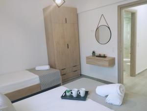 Postel nebo postele na pokoji v ubytování GRAMMENOS HOUSE