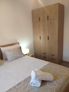 Postel nebo postele na pokoji v ubytování GRAMMENOS HOUSE
