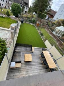Ein Garten an der Unterkunft Exclusive Unterkunft in 15min bis Hallenstadion - Zürich City - Flughafen ZH