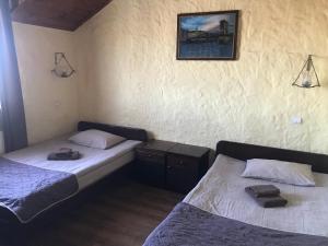Postel nebo postele na pokoji v ubytování Complex Khutor