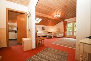 a hallway with a living room and a dining room at Am Hadermarkt in Ruhpolding