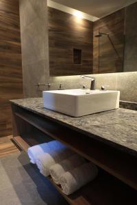 Um banheiro em Heura Petit Hotel