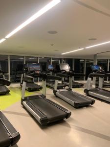 a gym with a bunch of treadmills and machines at Hotel Nacional RJ - Vista Mar in Rio de Janeiro