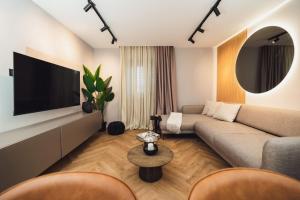 Телевизор и/или развлекательный центр в Villa Silente