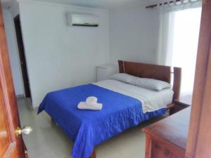 Postel nebo postele na pokoji v ubytování Hotel Palma Real Cartagena