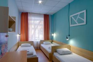 Posteľ alebo postele v izbe v ubytovaní Hostel Podolski Plus