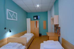 Posteľ alebo postele v izbe v ubytovaní Hostel Podolski Plus