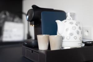 Kaffee-/Teezubehör in der Unterkunft Li Ter Hôtel