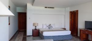 Giường trong phòng chung tại Hotel y Museo Casa Turquesa +46 ảnh