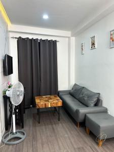Posezení v ubytování CJ Apartments