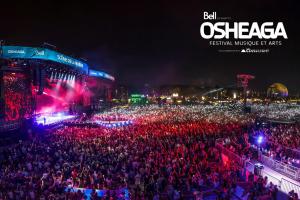 a large crowd of people at a concert at night at Studio & Office -Walk anywhere Downtown + Hospital in Montréal