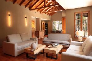 Uma área de estar em Heura Petit Hotel