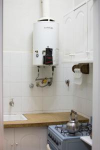 Kuchyň nebo kuchyňský kout v ubytování Departamento en peatonal frene al mar