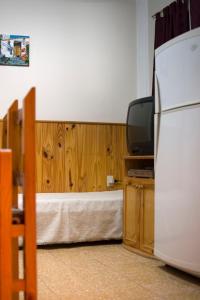 TV a/nebo společenská místnost v ubytování Departamento en peatonal frene al mar