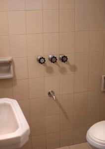 Koupelna v ubytování Departamento en peatonal frene al mar