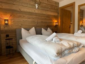 Voodi või voodid majutusasutuse Alpin- Chalet Gaisberg toas