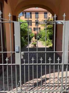 an entrance to a building with an iron gate at Studio centre-ville Petite Venise in Colmar