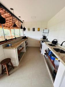 Køkken eller tekøkken på Casa Passarinho