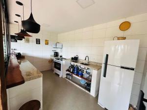 Køkken eller tekøkken på Casa Passarinho + 24 billeder