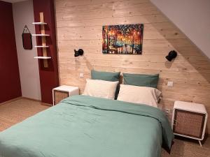 Postel nebo postele na pokoji v ubytování Maison d hôtes SPA Pivoine et Colibri