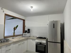 Kuchyň nebo kuchyňský kout v ubytování Domaine de la villa d’orge