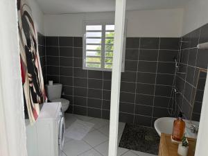 Koupelna v ubytování Domaine de la villa d’orge + 7 fotografií
