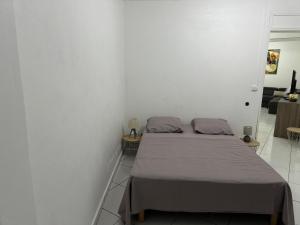 Postel nebo postele na pokoji v ubytování Domaine de la villa d’orge