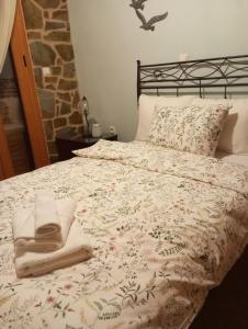 Postel nebo postele na pokoji v ubytování Ktima Karadimou + 9 fotografií
