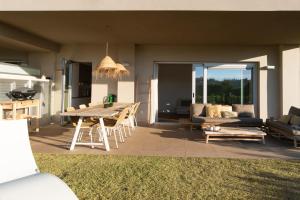A seating area at Chic 3BR Haven - Luxury Ground Floor - La Cala Golf