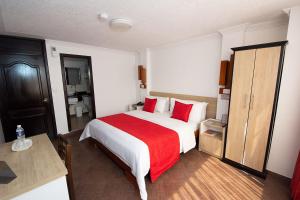 Postel nebo postele na pokoji v ubytování Hotel Plaza Victoria