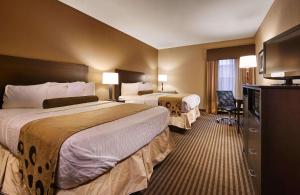 Ένα ή περισσότερα κρεβάτια σε δωμάτιο στο Best Western Plus Mishawaka Inn